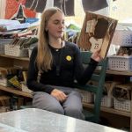 Seventh grade Mindfulness Ambassador reads to fourth graders